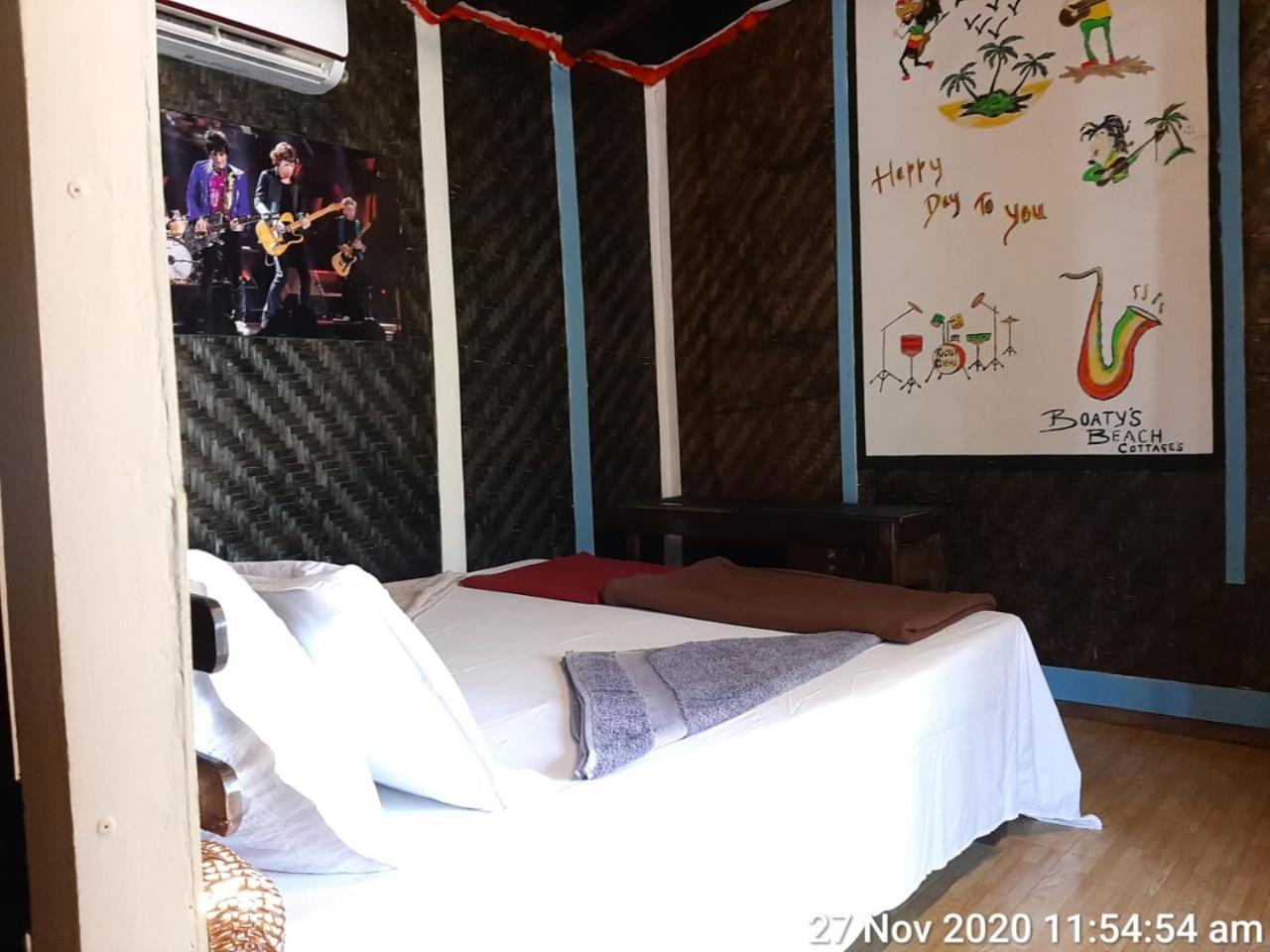 Boaty'S Beach Cottages กาลังกูติ ภายนอก รูปภาพ