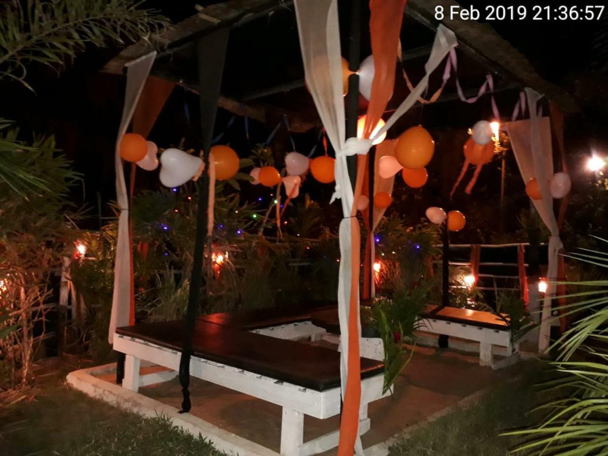 Boaty'S Beach Cottages กาลังกูติ ภายนอก รูปภาพ